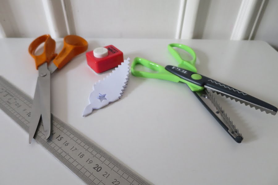 Use serrated scissors and a hole punch