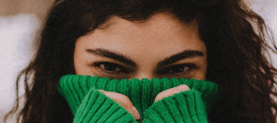 Woman with green winter sweater
