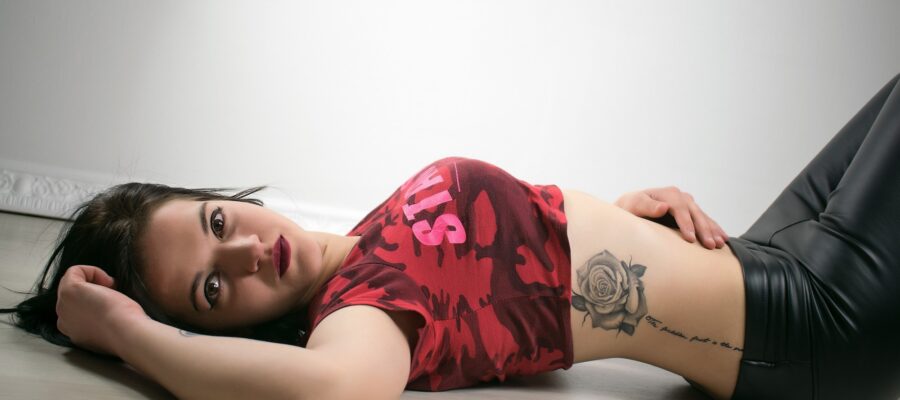 Photo shooting of a teen with a tattoo